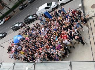 attendees of drupal developer days standing in a crowd